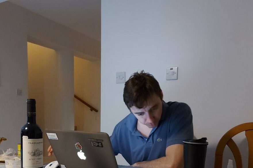 Andrii at a laptop on New Year's night, keeping an eye on the node